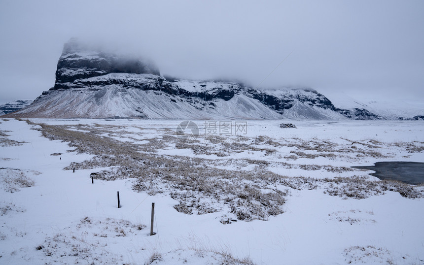 生物圈黄昏冰岛南部沿岸风雪覆盖的山脉一带全岛风景观美丽图片