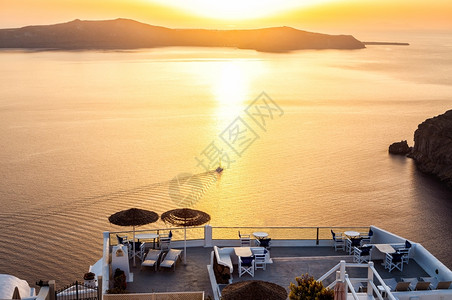 花天空季节希腊圣托里尼岛白色建筑希腊美丽的露台日落时有海景图像图片
