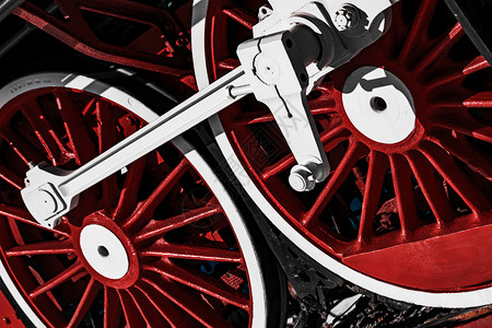 火车轮子红色的和白旧车轮的对比红白关上力量蒸汽背景