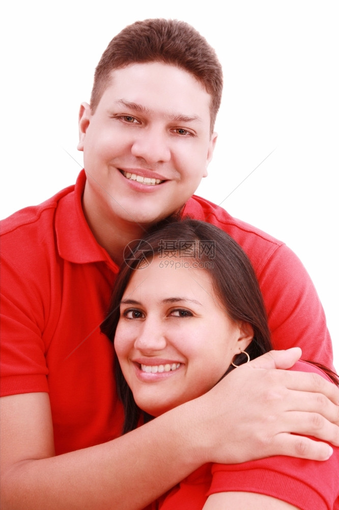 一对快乐的年轻夫妇在白色背景下共度欢乐的肖像女手头发图片