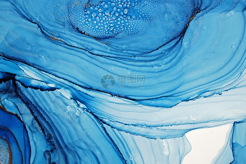 蓝色的复杂混合酒精墨水抽象背景宏观照片图片