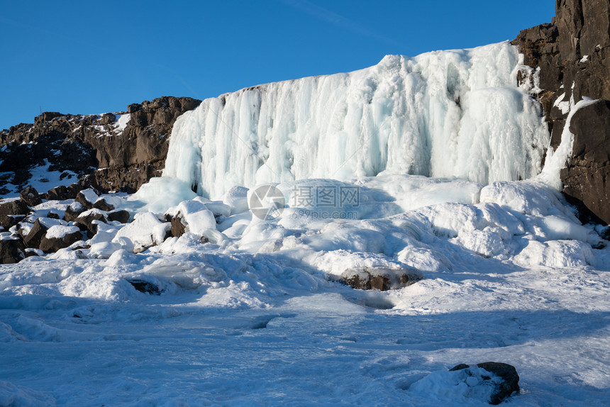 寒冷的生物群落欧洲冰岛廷韦利尔公园内冻结的瀑布Oexarfos农村图片