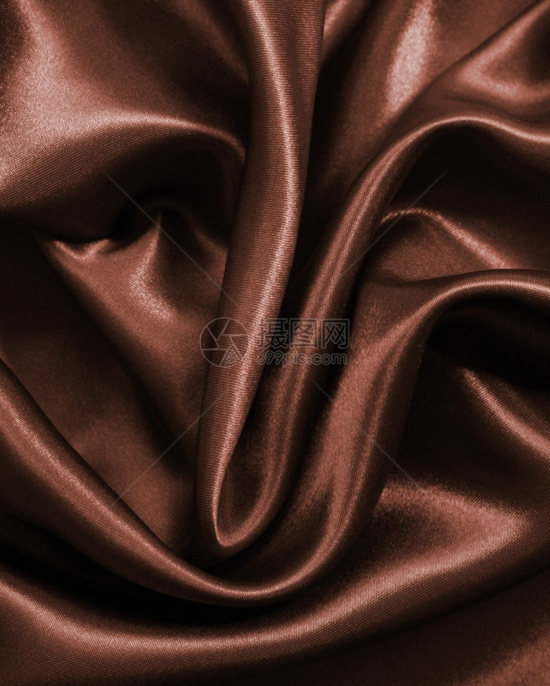 海浪平滑优雅的深褐色巧克力丝可用作背景豪华柔软的图片