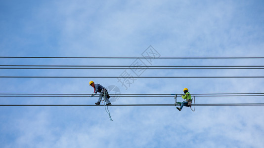 天空手动的泰国高压电缆系统和云天背景的安装和改造泰国修改图片