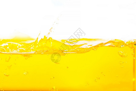 油橙色水溅面飞和白背景上的气泡质地健康高清图片