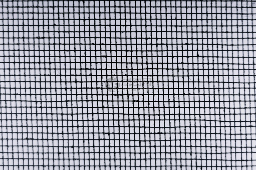 轮廓网格模糊的抽象最小风格黑色和蒙山的阳光在金属丝网钢上投下阴影模糊的抽象最小风格黑色和蒙山的阳光在金属丝网钢上投射阴影屏障图片