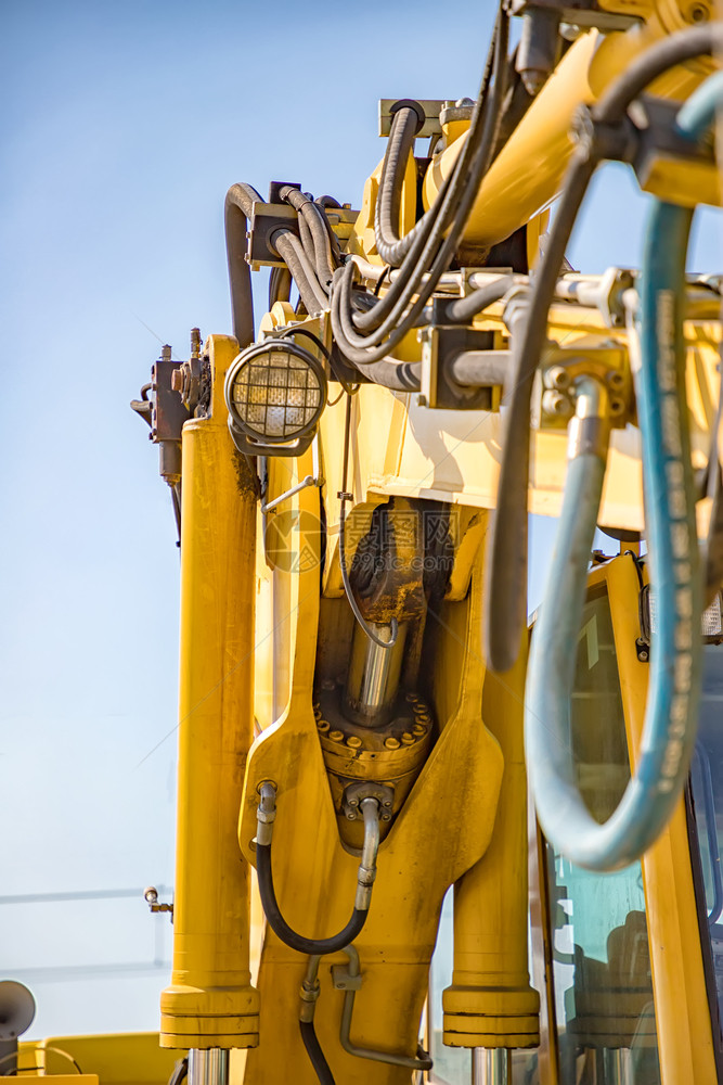 液压现代黄色挖土机部件的垂直视图Name车辆舀图片