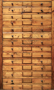 背景和纹理非常古老的木制柜子内有抽屉木制柜子内有抽屉数据破旧图片