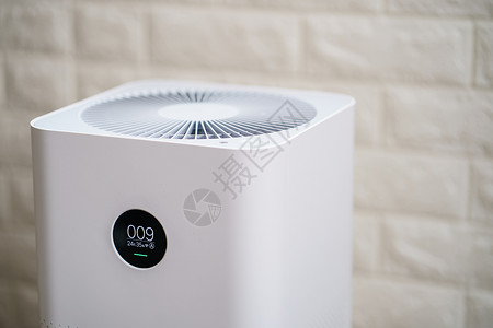 卧室空气净化器流感抽烟用监视屏幕封闭空气净化器显示房间的空气质量PM25概念器具背景