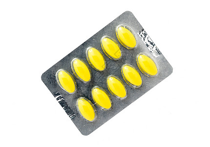 卫生保健包裹橙一组黄色胶囊药物孤立在白色背景的黄药片丸图片