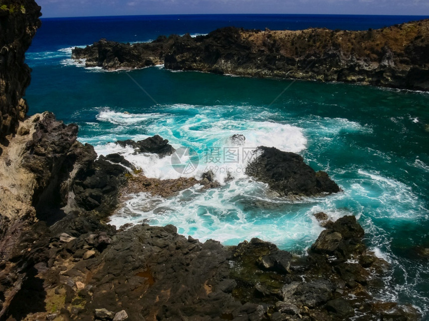 蓝色的旅游杭加复活节岛海岸线复活节岛海岸岩石和洋复活节岛岸线复活节岛海岸岩石洋图片