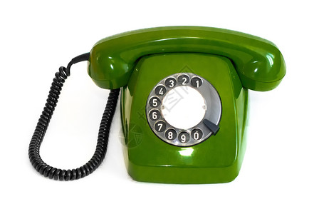 老的古典中央白色背景上的复古绿色旋转电话白背景上的旧绿旋转电话图片