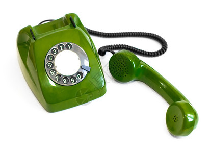 白色背景上的复古绿色旋转电话白背景上的旧绿旋转电话连接传统沟通图片