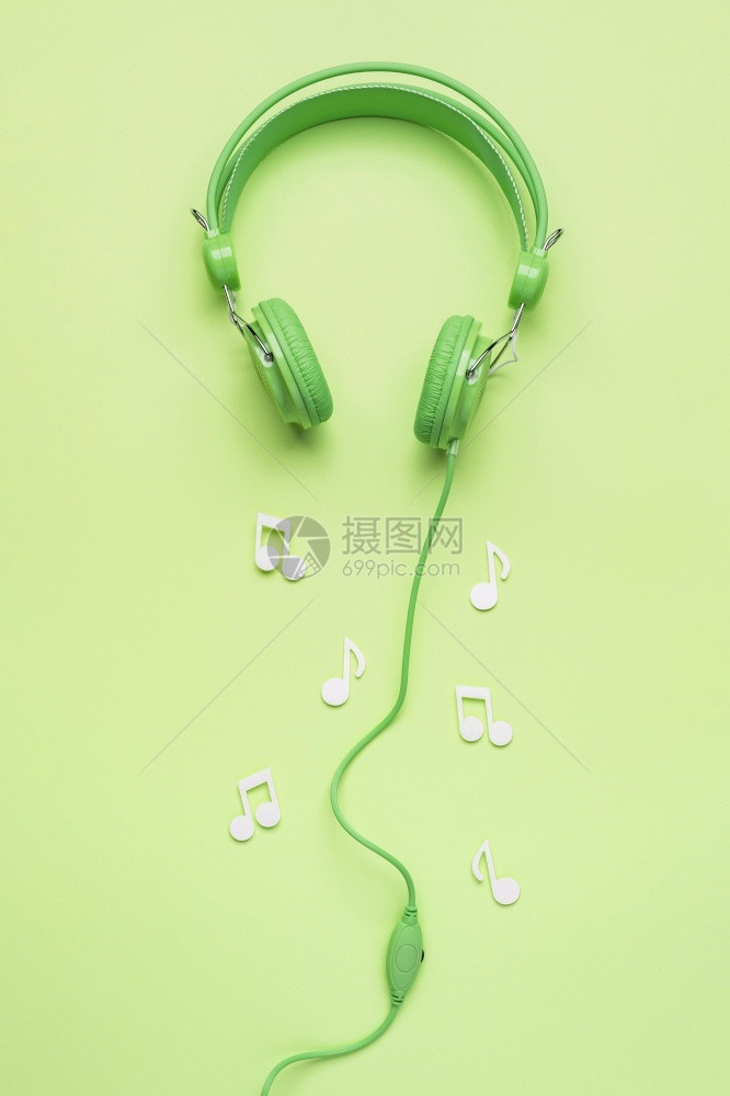 磁盘橙用白色音乐笔记的绿耳机高清晰度光照绿色耳机用白音乐笔记的绿色耳机电子图片