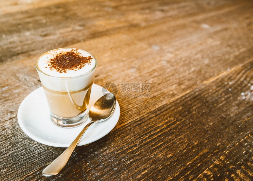 玻璃牛奶卡布奇诺咖啡装扮的顶视图白色杯子装卡布奇诺咖啡的顶部视图白色杯子装扮泡沫图片
