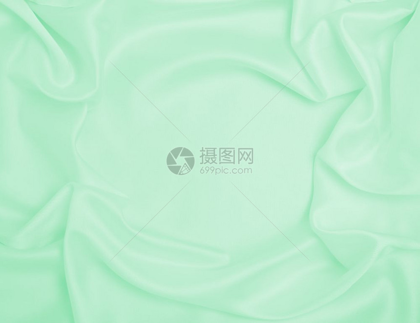平滑优雅的绿色丝绸或席边奢华布质料可用作抽象背景豪华设计折痕光滑的自然图片