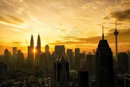 镇建筑学马来西亚首都吉隆坡市中心天际线在黄昏时的轮光拍摄外部图片