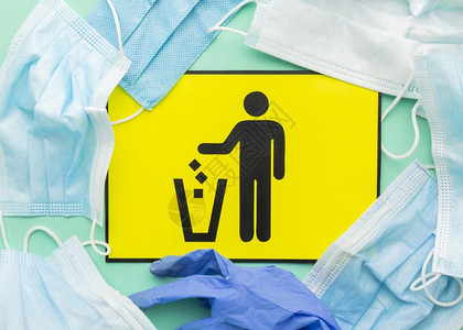 扔垃圾桶符号医疗面罩回收错误的干净图片