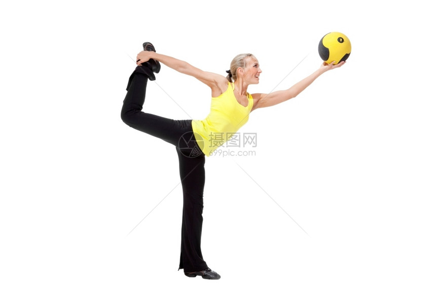 复制与体型球相配的美貌丽年轻女青子她们用黄色和黑球锻炼仅有的图片
