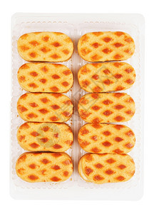 蜜糖盒塑料包装中的软杏仁饼干在白色上隔离美食图片