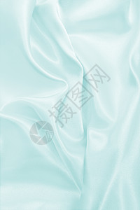 平滑优雅的蓝色丝绸或席边奢华布质料可用作抽象背景本色设计织物能够纺品图片