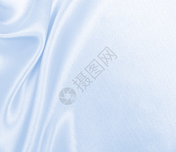 平滑优雅的蓝色丝绸或席边奢华布质料可用作抽象背景本色设计冬天银色时尚背景图片