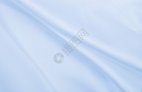 平滑优雅的蓝色丝绸或席边奢华布质料可用作抽象背景本色设计质地闪亮的银背景图片