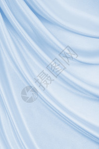 平滑优雅的蓝色丝绸或席边奢华布质料可用作抽象背景本色设计装饰感闪亮图片