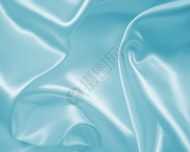 美丽的折痕平滑优雅蓝色丝绸或可用作背景投标图片