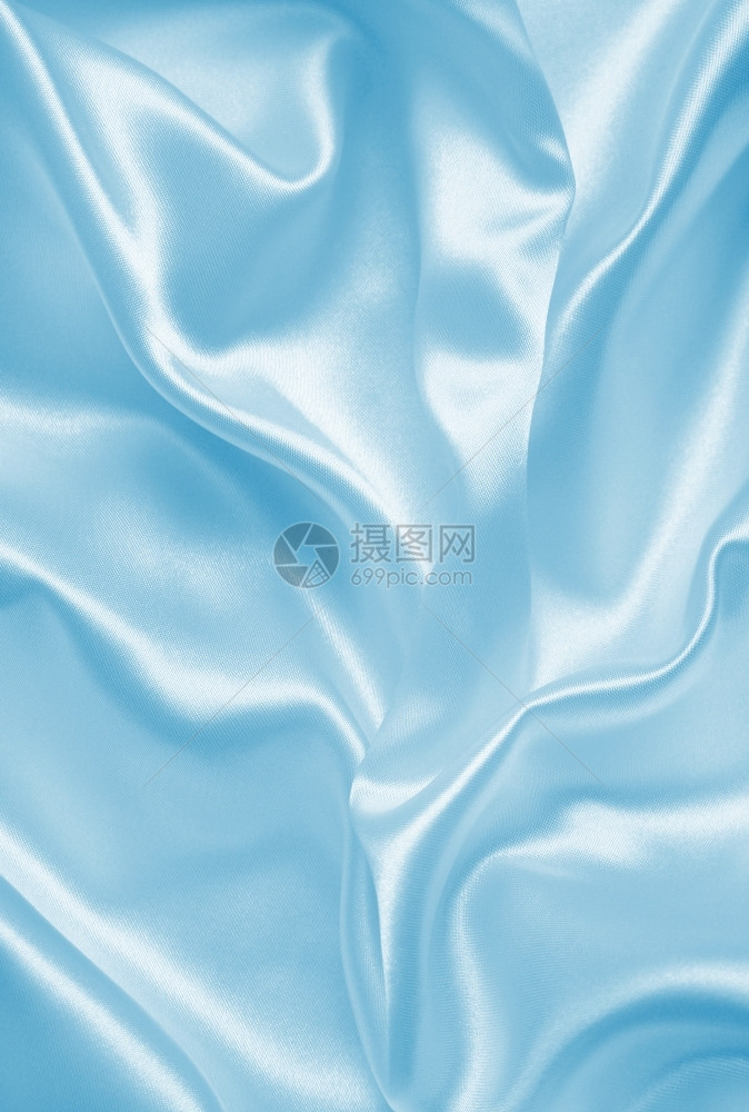 质地平滑优雅的蓝色丝绸或可用作背景光滑的版税图片