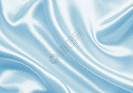 缎面美丽的闪亮平滑优雅蓝色丝绸或可用作背景图片
