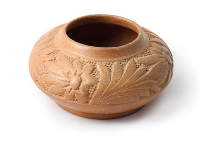 非常古老的棕色粘土锅用阴影遮盖白本底花瓶文化图片