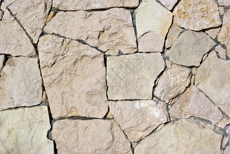地质学稠密具有不同大小几何石块的坚固墙无机物图片