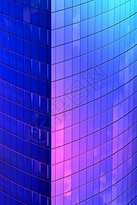 玻璃摩天大楼墙壁垂直拍摄的亮色办公大楼反射镜像正面质地闪耀图片