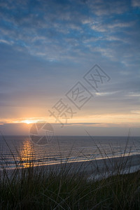 颜色荷兰海滩日落的景色晴天自然图片