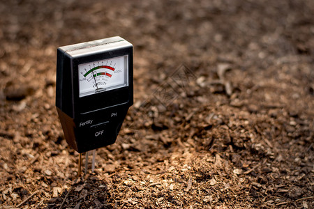 土壤测量表用于岩浆种植自然乡村的泥图片