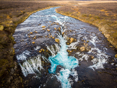 大连金普新区天线雄伟水冰岛美丽的大连级布鲁马福斯瀑背景
