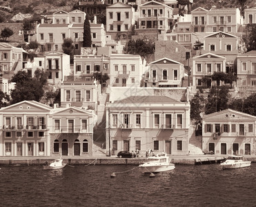 复古棕褐色码头夏天希腊Dodecanesses岛SymiSimi多姿彩的房屋村庄语气背景