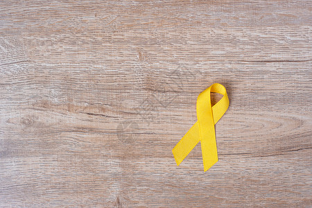 黄色丝带预防儿童癌症概念图片