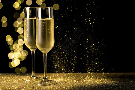 冰桶里的香槟分辨率和高品质的美丽光照香槟杯子及bokeh灯光优质美容照片概念优美的照片一高质量眼镜起泡的饮料设计图片