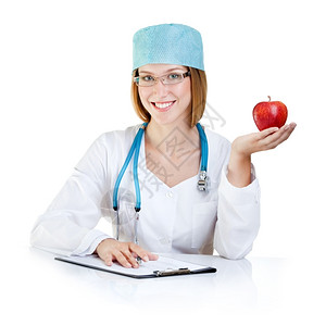 保持拥有红苹果的女医生微笑健康活方式和微笑实验室坐着图片
