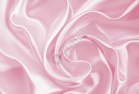 平滑优雅的粉色丝绸或可以用作婚礼背景银色缎海浪图片