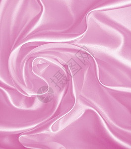 质地光滑的折痕平优雅粉色丝绸或纹质可用作背景图片