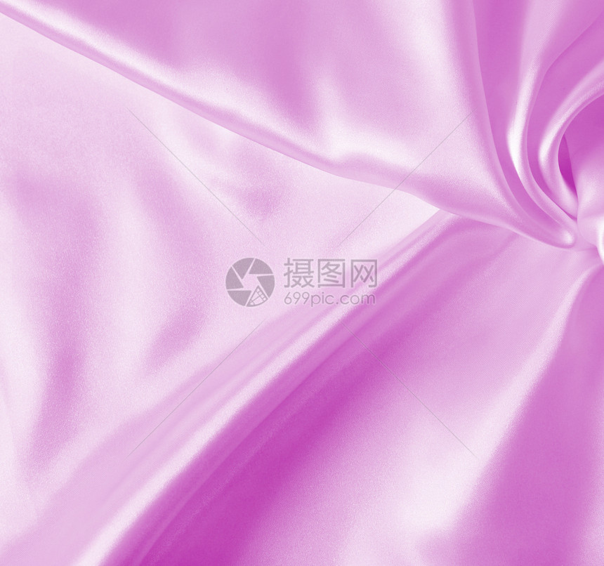织物平滑优雅的粉色丝绸或纹质可用作背景抽象的自然图片