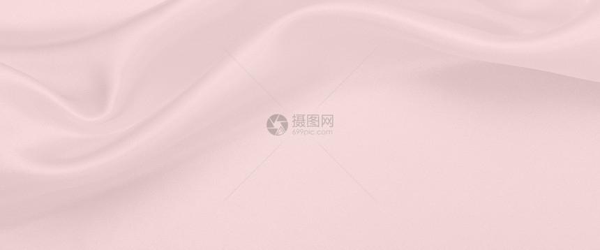 光滑的平优雅粉色丝绸或派文纹理可用作婚礼背景材料折痕投标图片