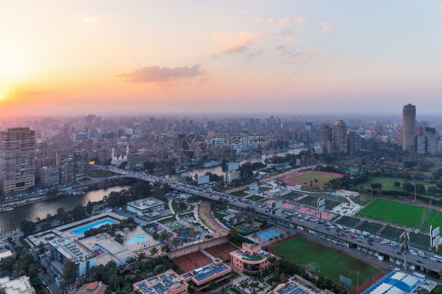 开罗市中心日落景尼罗河和埃及热济拉岛美丽的摩天大楼景观图片