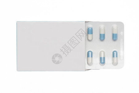 白色盒子蓝胶囊泡在孤立背景的白色盒子里蓝胶囊泡在单边背景上麻醉剂免疫图片