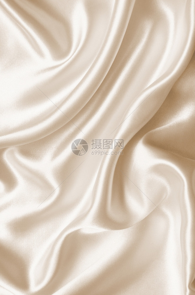 浅褐色的浪漫平滑优雅金丝绸可以用作婚礼背景在SepiatonedRetro风格下折痕图片