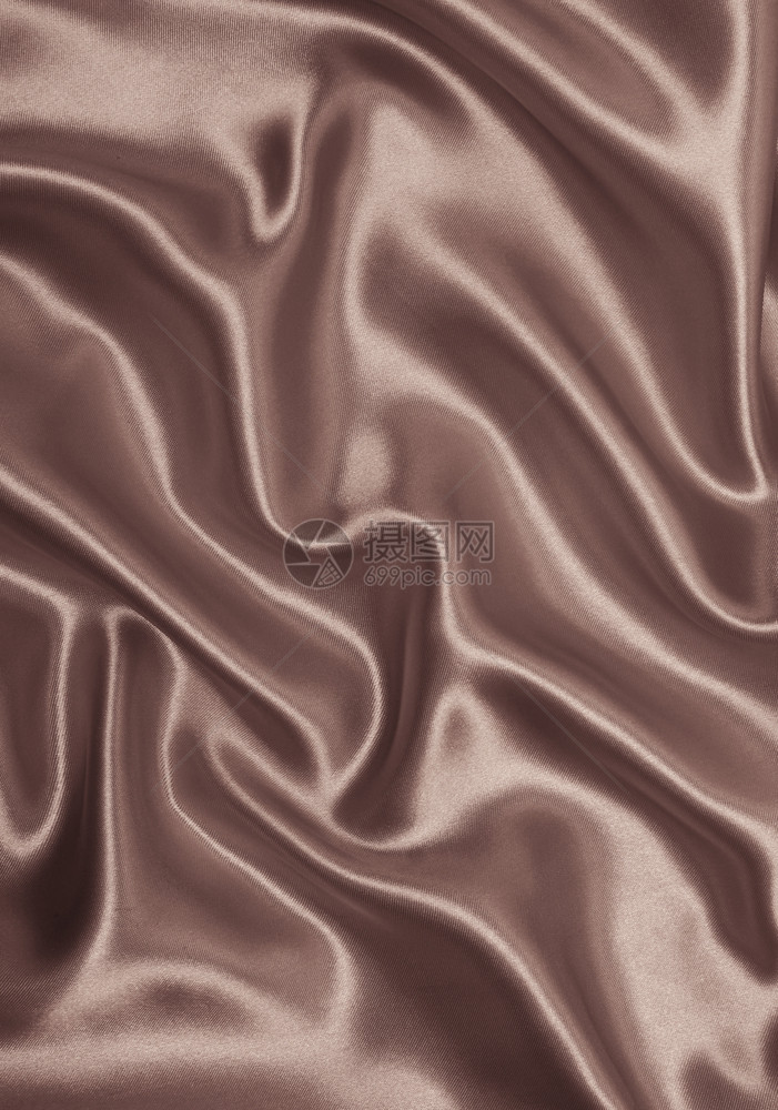 平滑优雅的金色丝绸可用作SepiatonedRetro风格的背景优质明亮颜色图片