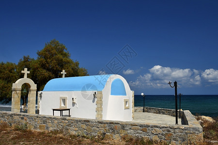 希腊克里特岛日落时美丽的希腊小礼拜堂旅行地中海高清图片